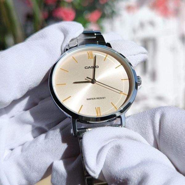 Женские часы CASIO LTP-VT01D-4B серебристые с розовым циферблатом LTP-VT01D-4B фото