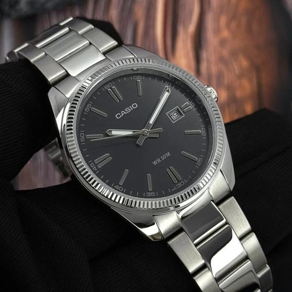Мужские часы CASIO MTP-1302D-1A1 серебристые с черным циферблатом MTP-1302D-1A1 фото