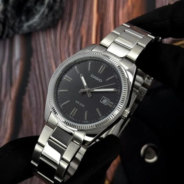 Мужские часы CASIO MTP-1302D-1A1 серебристые с черным циферблатом MTP-1302D-1A1 фото