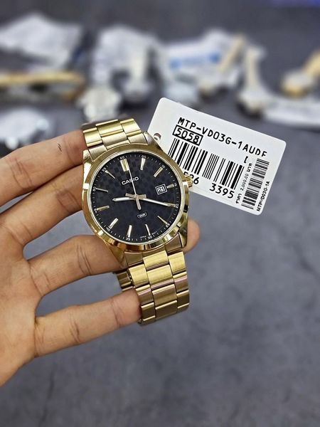 Чоловічий годинник CASIO MTP-VD03G-1AUDF класичний золотистий з шахматним циферблатом 104523749 фото