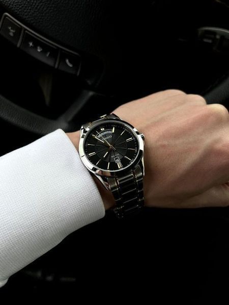 Чоловічий годинник CASIO MTP-1381G-1A комбінований Data Day з чорним циферблатом 104180190 фото