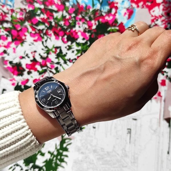 Жіночий годинник CASIO LTP-1215A-1A круглі з чорним циферблатом та цифрами 107585571 фото