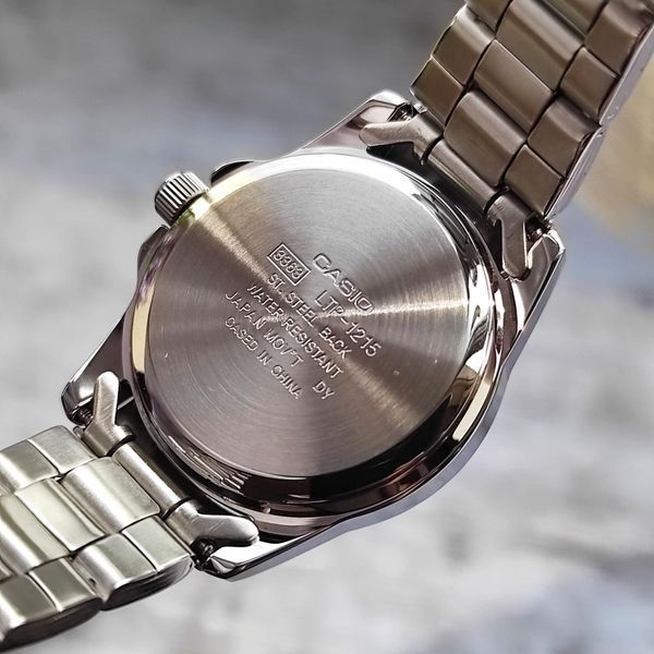 Жіночий годинник CASIO LTP-1215A-1A круглі з чорним циферблатом та цифрами 107585571 фото