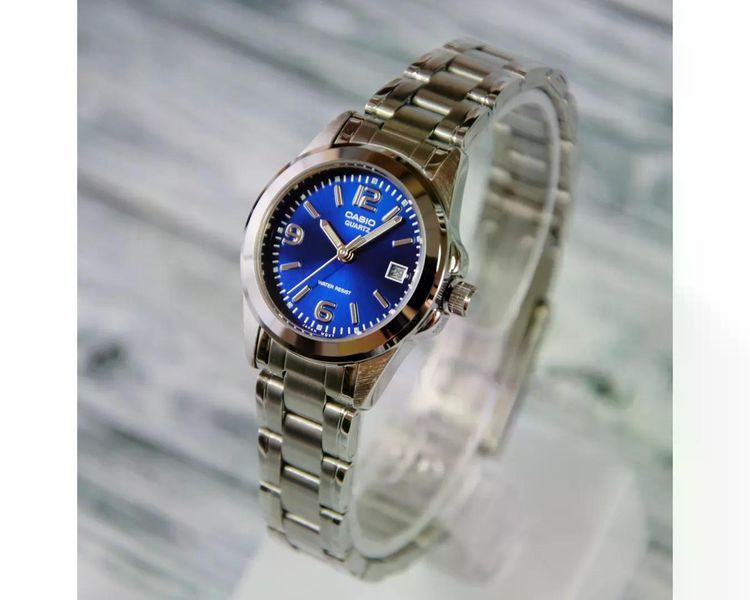 Жіночий годинник CASIO LTP-1215A-2A круглі з синім циферблатом та цифрами 107587792 фото