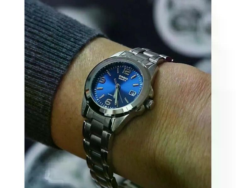 Жіночий годинник CASIO LTP-1215A-2A круглі з синім циферблатом та цифрами 107587792 фото