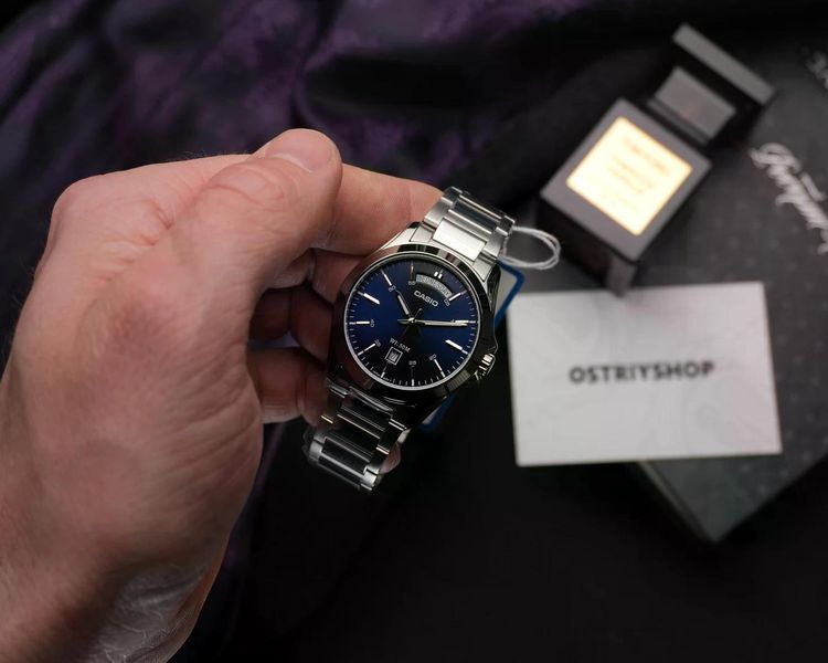 Чоловічий годинник CASIO MTP-1370D-2A2 Data Day сріблястий з синім циферблатом та датою 122705162 фото