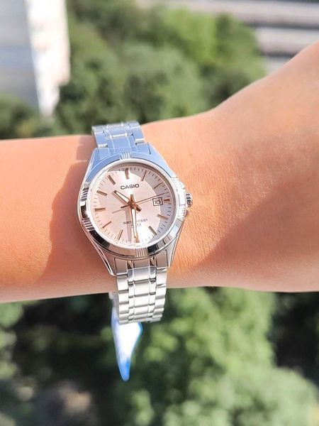 Женские часы CASIO LTP-1308D-4A серебристые с розовым циферблатом 113031339 фото