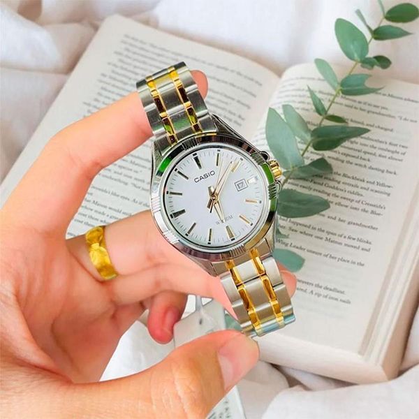 Жіночий годинник Casio LTP-1308SG-7A комбінований з білим циферблатом 113882015 фото