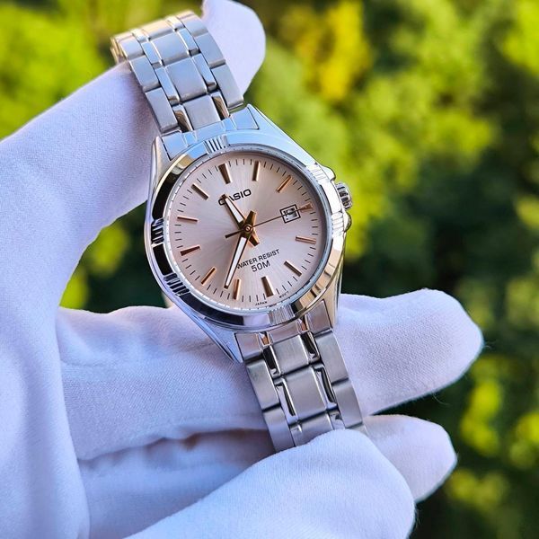 Женские часы CASIO LTP-1308D-4A серебристые с розовым циферблатом 113031339 фото
