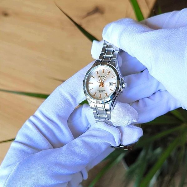 Женские часы CASIO LTP-1308D-4A серебристые с розовым циферблатом 113031339 фото