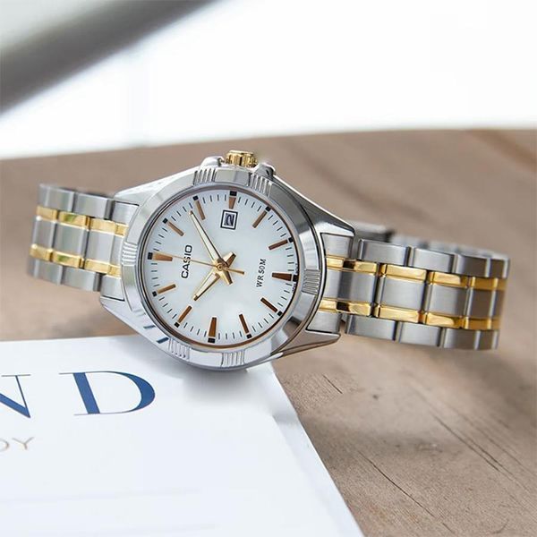 Жіночий годинник Casio LTP-1308SG-7A комбінований з білим циферблатом 113882015 фото