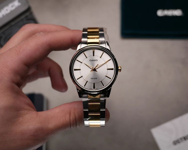 Чоловічий годинник CASIO MTP-1303SG-7AVEF комбінований з сріблястим циферблатом MTP-1303SG-7AVEF фото