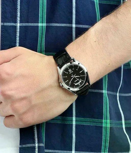 Чоловічий годинник CASIO MTP-1370L-1A Data Day сріблястий з чорним циферблатом на шкіряному ремінці 106770843 фото