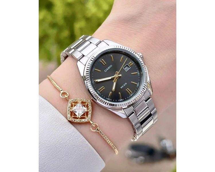 Женские часы CASIO LTP-1302D-1A2VDF серебристые с черным циферблатом 1048103951 фото