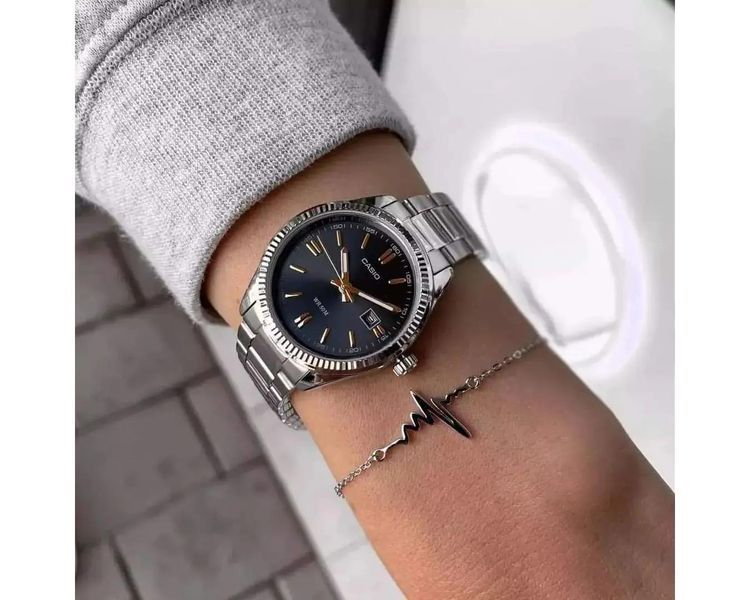 Женские часы CASIO LTP-1302D-1A2VDF серебристые с черным циферблатом 1048103951 фото