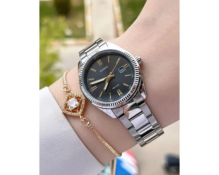 Женские часы CASIO LTP-1302D-1A2VDF серебристые с черным циферблатом 1048103951 фото