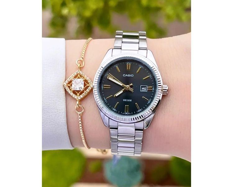 Женские часы CASIO LTP-1302D-1A2VDF серебристые с черным циферблатом 1048103951 фото