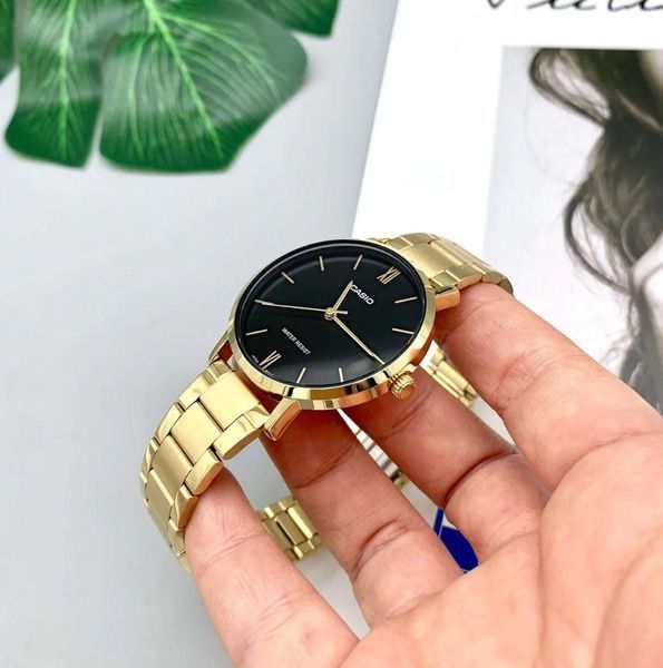 Женские часы CASIO LTP-VT01G-1BUDF золотистые с черным циферблатом 104814531 фото