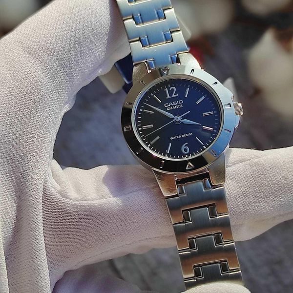 Жіночий годинник CASIO LTP-1177A-1A сріблясті з чорним циферблатом та цифрами 113882075 фото