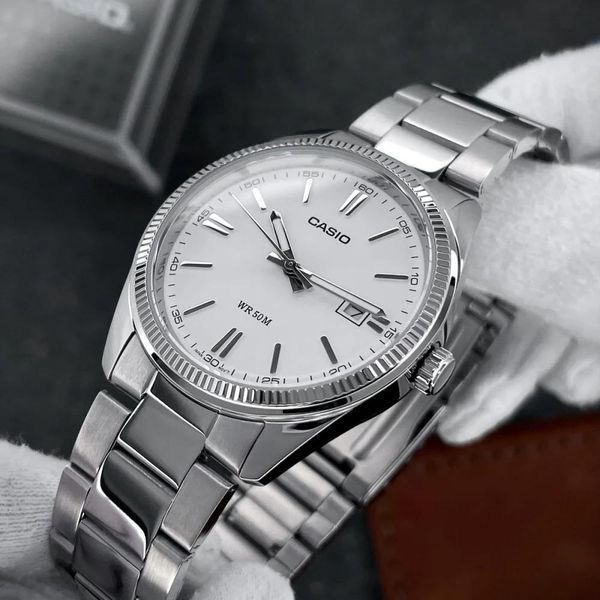 Мужские часы CASIO MTP-1302D-7A1VEF серебристые с белым циферблатом 104136394 фото
