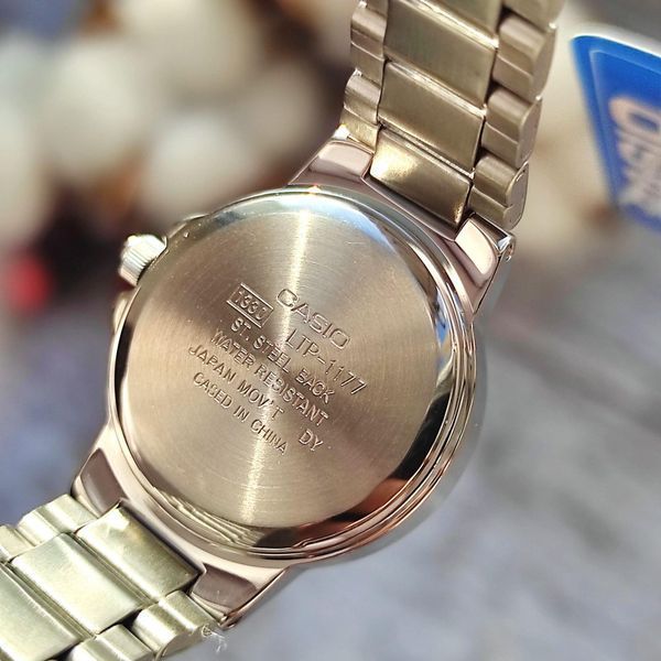 Жіночий годинник CASIO LTP-1177A-1A сріблясті з чорним циферблатом та цифрами 113882075 фото