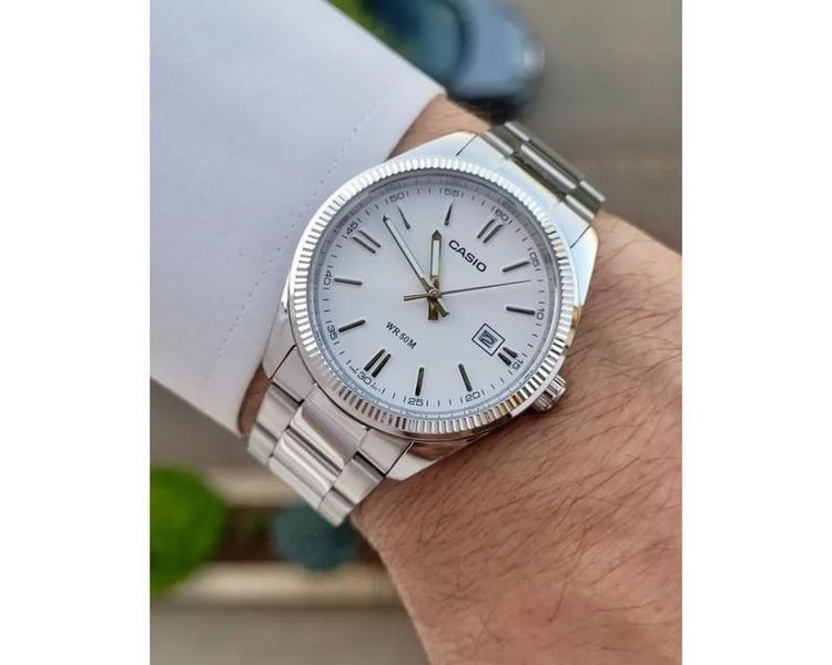 Мужские часы CASIO MTP-1302D-7A1VEF серебристые с белым циферблатом 104136394 фото
