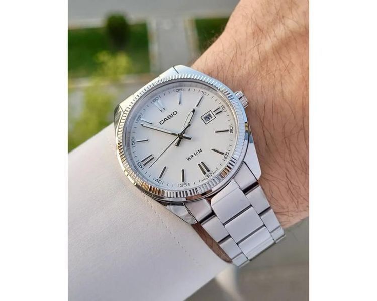 Мужские часы CASIO MTP-1302D-7A1VEF серебристые с белым циферблатом 104136394 фото