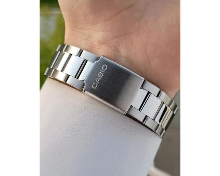 Мужские часы CASIO MTP-1302D-7A1VEF серебристые с белым циферблатом 104136394 фото