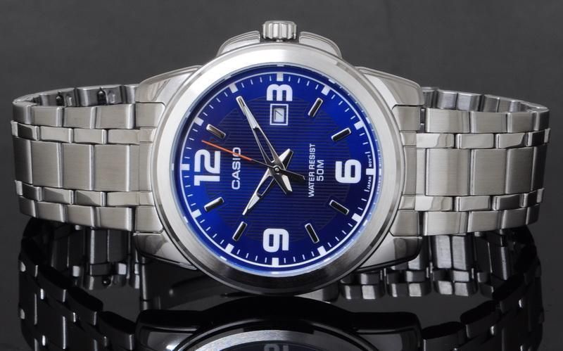 Чоловічий годинник CASIO MTP-1314D-2AVDF сріблястий масивний з арабськими цифрами синій циферболат 1045190704554 фото