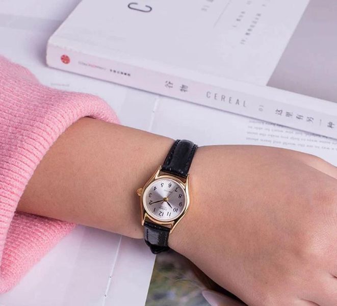 Женские часы Casio LTP-1094Q-7B2 золотистые с цифрами на кожаном ремешке 113882990 фото