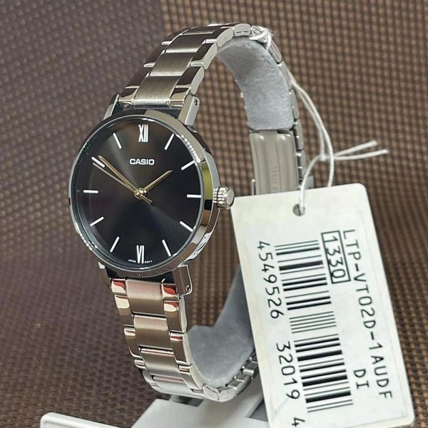 Женские часы CASIO LTP-VT02D-1A серебристые с черным циферблатом 104823546 фото