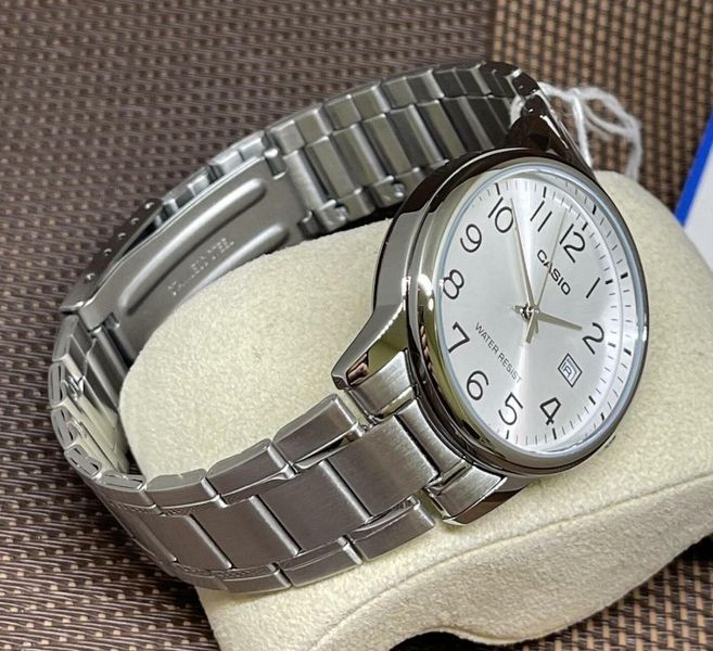Мужские часы CASIO MTP-V002D-7B серебристые с арабскими цифрами 113882123 фото