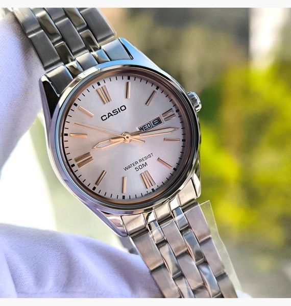 Жіночий годинник CASIO LTP-1335D-4A сріблясті з рожевим циферблатом 104831561 фото