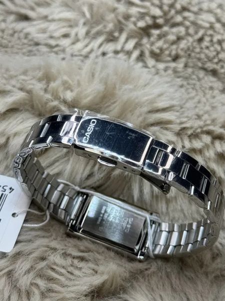 Жіночий годинник CASIO LTP-1234DD-4A прямокутні з рожевим циферблатом 80003178 фото
