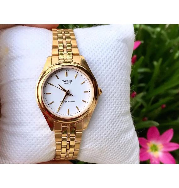 Женские часы CASIO LTP-1129N-7A золотистые с белым циферблатом 114902128 фото