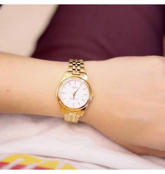 Женские часы CASIO LTP-1129N-7A золотистые с белым циферблатом 114902128 фото