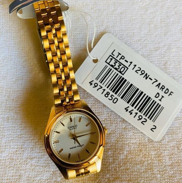 Женские часы CASIO LTP-1129N-7A золотистые с белым циферблатом 114902128 фото