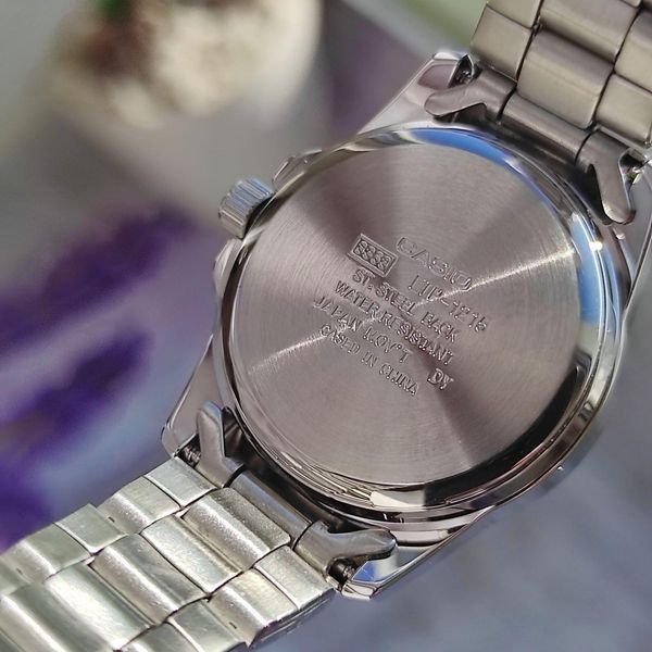 Жіночий годинник CASIO LTP-1215A-2A2 сріблясті з синім циферблатом 119630220 фото