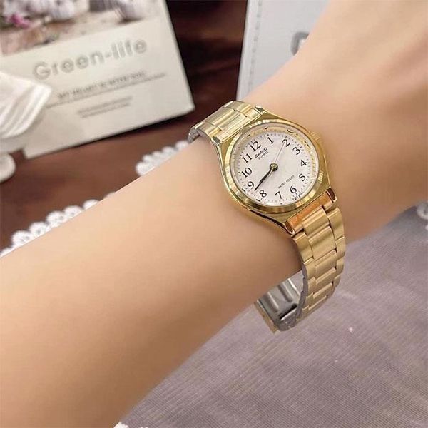 Женские часы CASIO LTP-1130N-7B золотистые с белым циферблатом и цифрами 113882532 фото