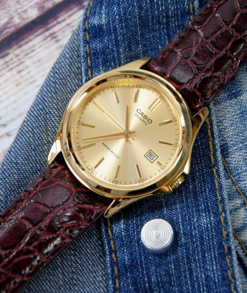 Чоловічий годинник CASIO MTP-1183Q-9ADF золотисті на шкіряному ремінці MTP-1183Q-9ADF фото