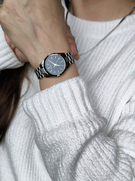 Женские часы CASIO LTP-1274D-1A серебристые с черным циферблатом 113882873 фото